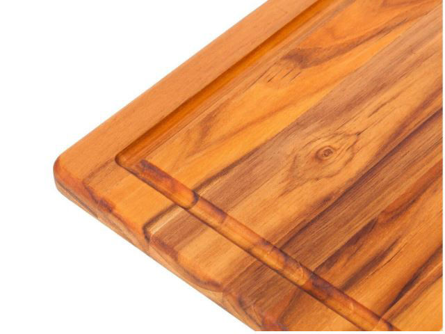 https://www.artisancraftedhome.com/images/thumbs/0066647_edge-grain-marine-rounded-rectangle-teak-cutting-board-with-juice-canal-by-proteak.jpeg