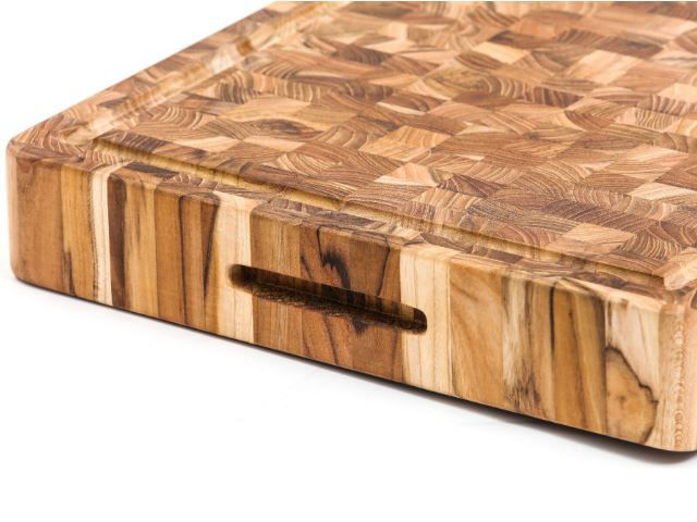 https://www.artisancraftedhome.com/images/thumbs/0066722_large-end-grain-rectangular-teak-wood-board-with-hand-grips-and-juice-canal-by-proteak.jpeg